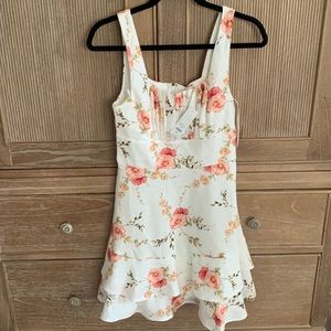 NWT from Francesca’s boutique size small women’s ivory with floral zip up dress